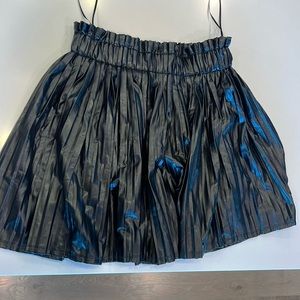 Women’s pleated faux leather mini skirt